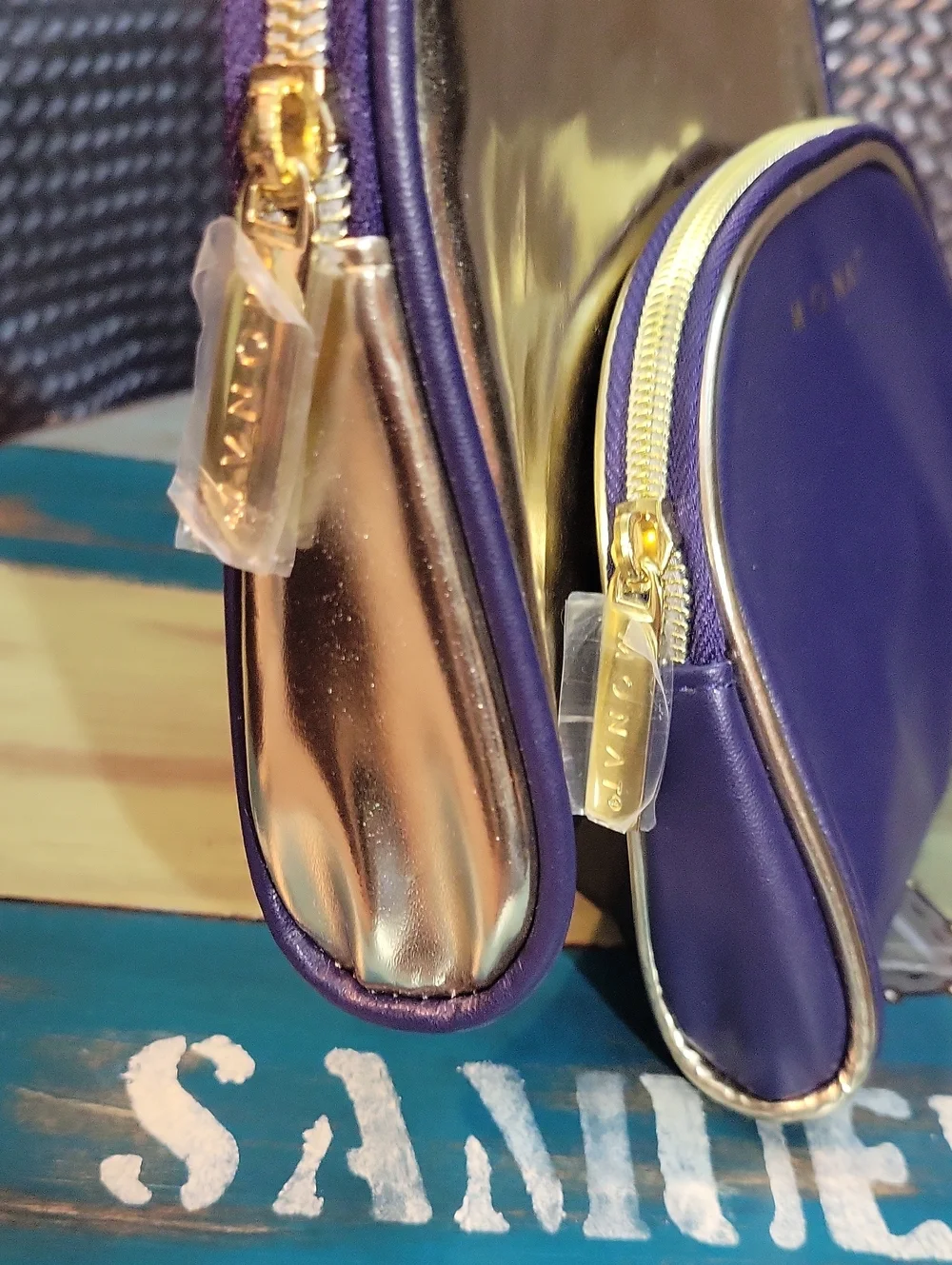 MONAT Metallic Gold and Purple Cosmetic Bag Set NWOT